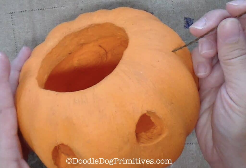 add wire handle to rustic pumpkin