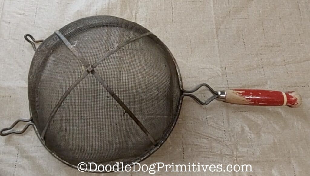 antique strainer