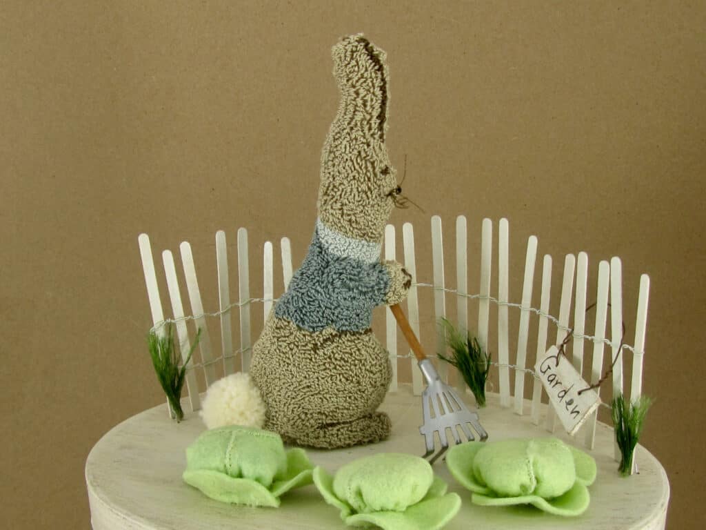 primitive punch needle garden bunny scene