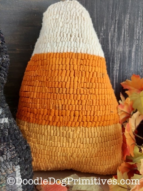 candy corn hooked rug pillow