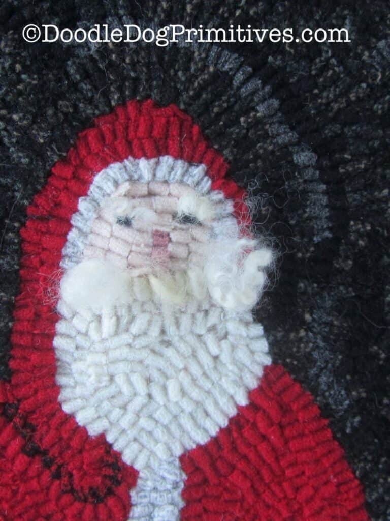 hooked rug santa face