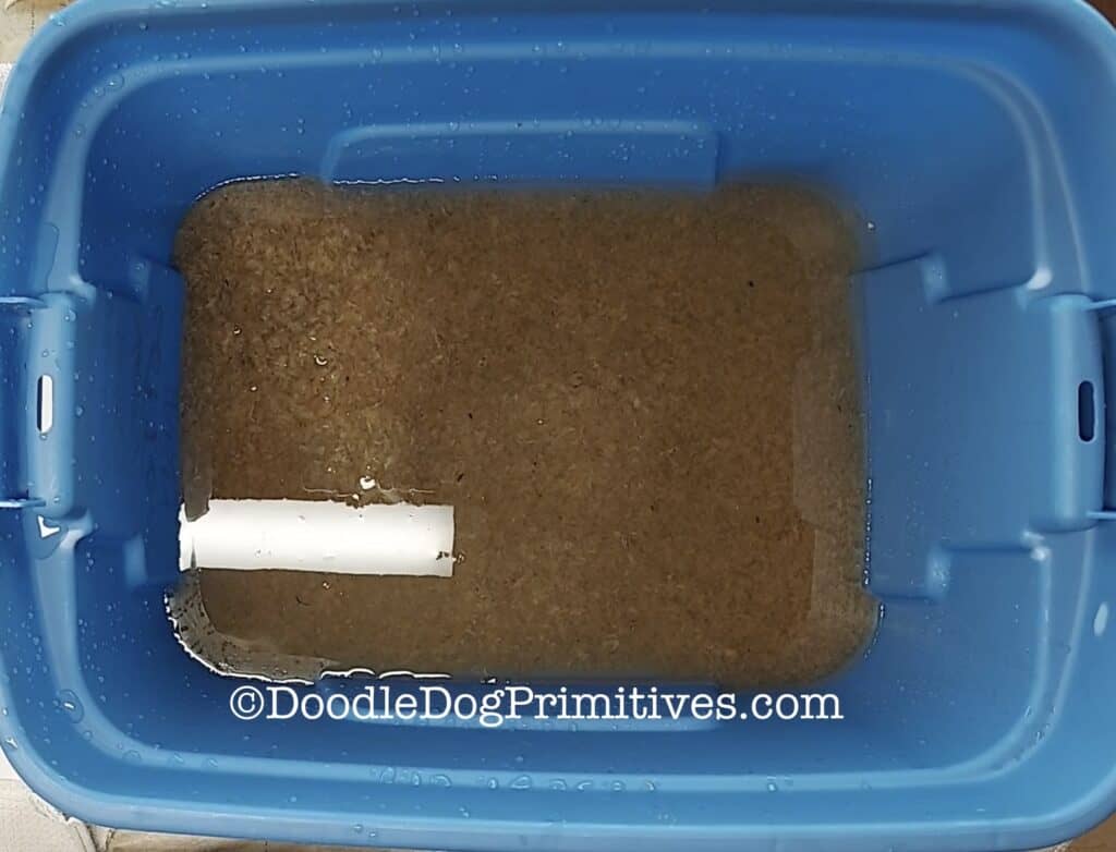 plastic tub with paper pulp