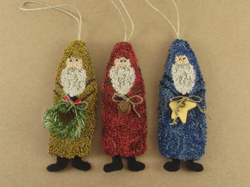three santa ornaments punch needle