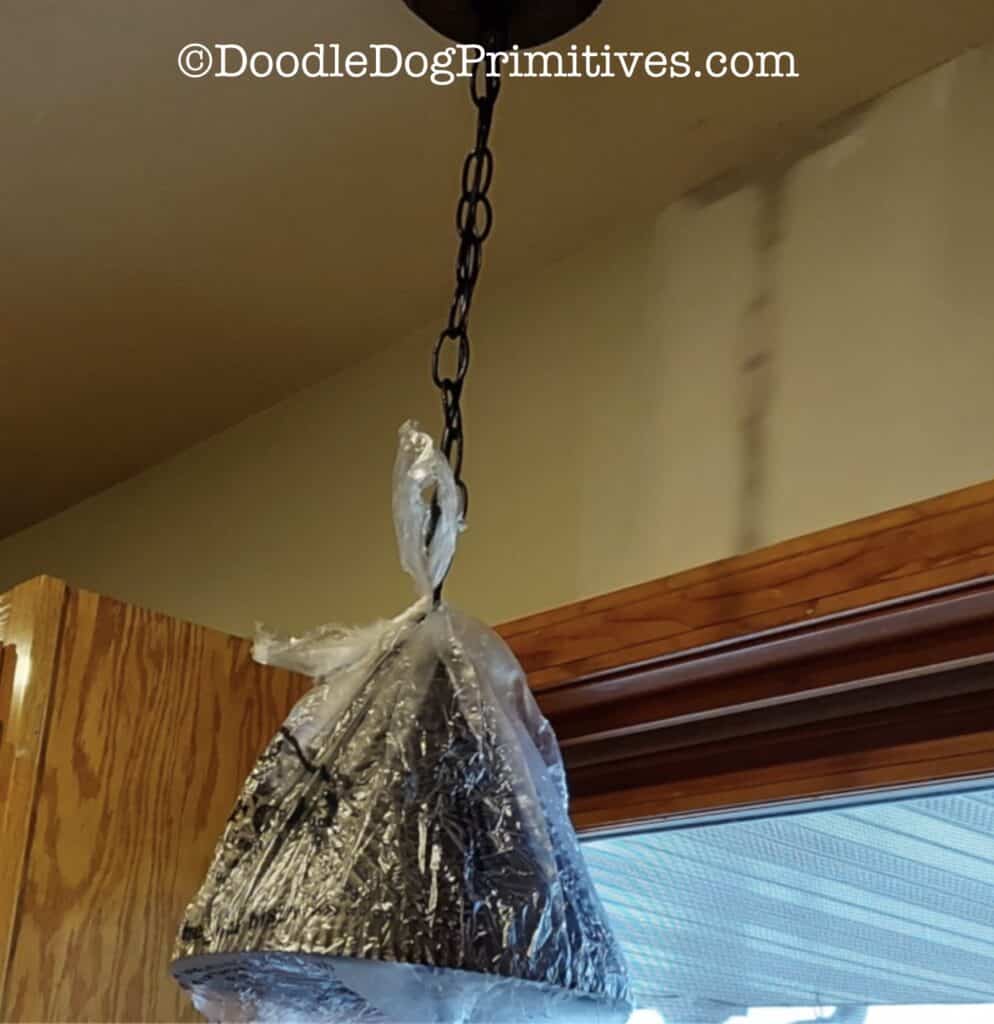 pendant light covered with bag