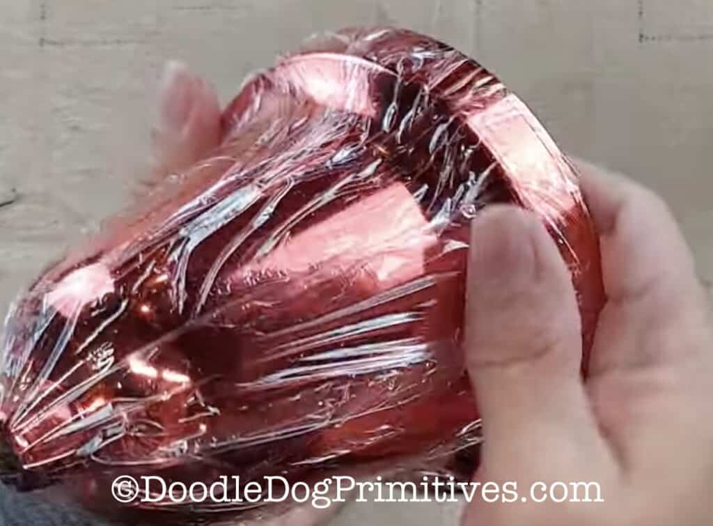 plastic wrap on bell