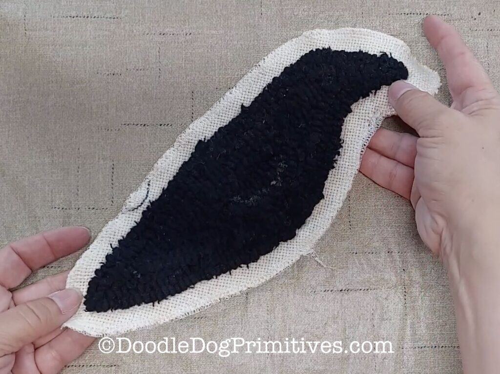 serge edges of hooked rug