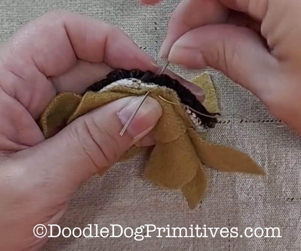 sew flower center to petals