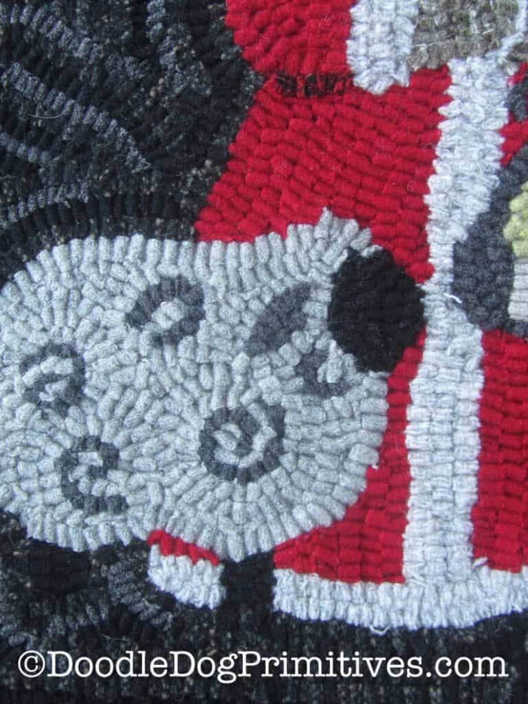 sheep on Christmas hooked rug