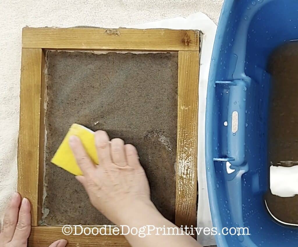 use sponge to soak up water