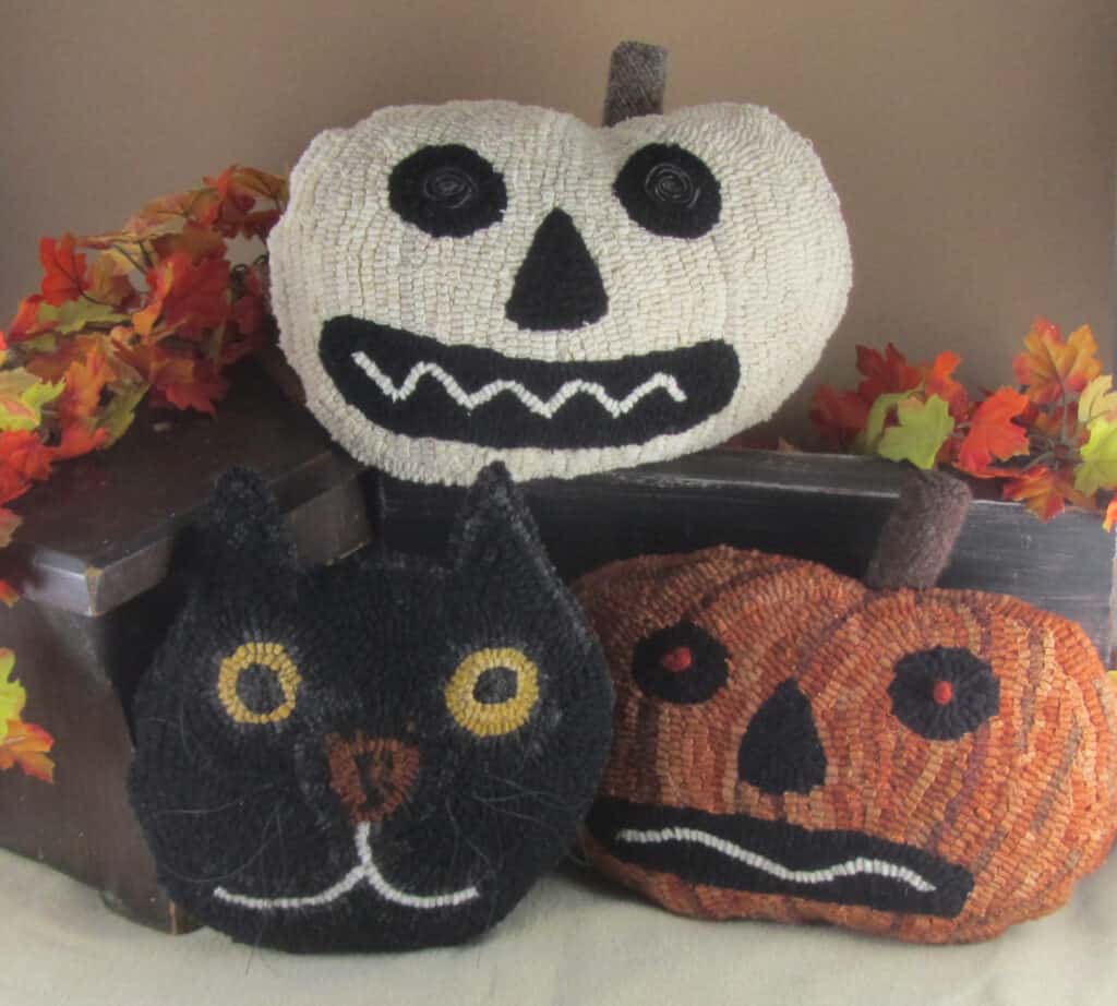 spooky trio hooked rug pillows