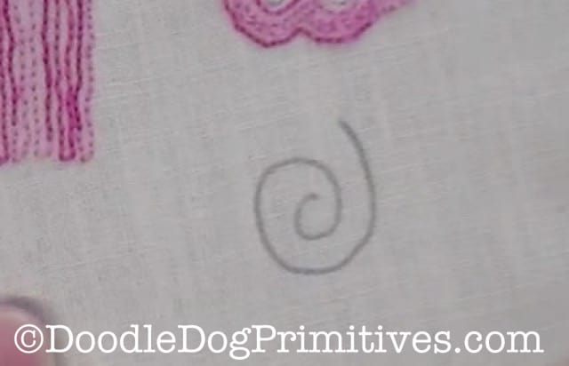 draw a swirl on the weavers cloth